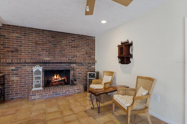 2723 59th St, Sarasota, FL 34243 - living area featuring baseboards, a ceiling fan, a brick fireplace, and recessed lighting