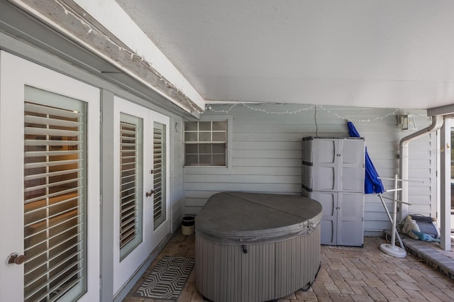 2723 59th St, Sarasota, FL 34243 - view of patio with a hot tub and french doors