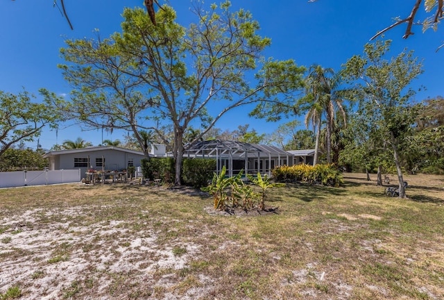 2723 59th St, Sarasota, FL 34243 - view of yard with a lanai and fence