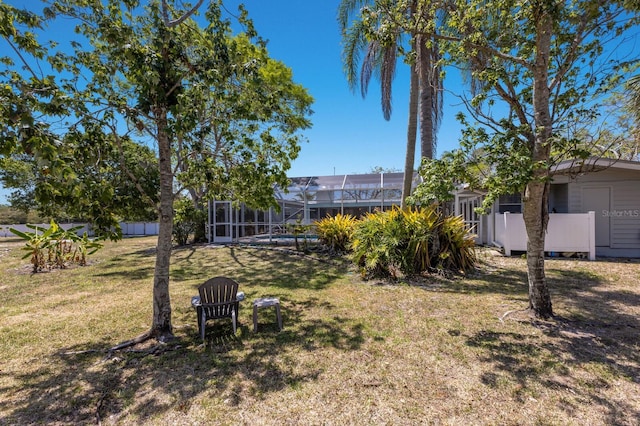 2723 59th St, Sarasota, FL 34243 - view of yard with glass enclosure