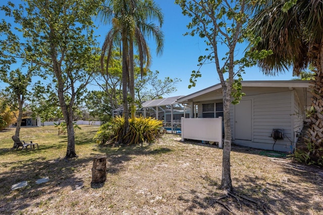 2723 59th St, Sarasota, FL 34243 - view of yard with glass enclosure