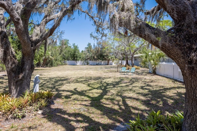 2723 59th St, Sarasota, FL 34243 - view of yard featuring fence