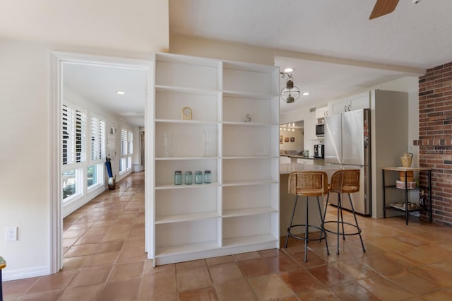 2723 59th St, Sarasota, FL 34243 - bar featuring freestanding refrigerator, recessed lighting, and ceiling fan