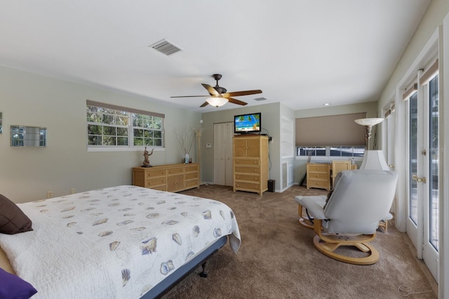 2723 59th St, Sarasota, FL 34243 - bedroom featuring ceiling fan, visible vents, and carpet