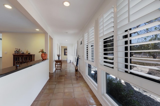 2723 59th St, Sarasota, FL 34243 - hall with recessed lighting, tile patterned floors, and a healthy amount of sunlight