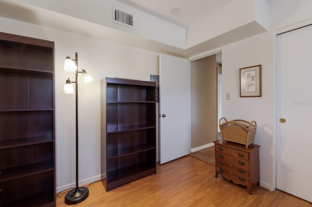 2723 59th St, Sarasota, FL 34243 - bedroom with baseboards, visible vents, and wood finished floors