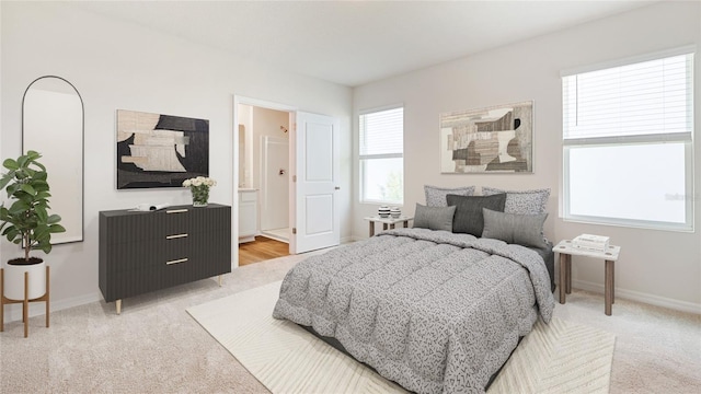 5030 Rocky Coast Pl, Palmetto, FL 34221 - bedroom featuring baseboards, light carpet, and ensuite bath