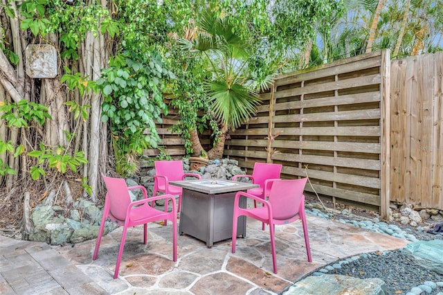 6343 Hollywood Blvd, Sarasota, FL 34231 - view of patio / terrace featuring a fire pit