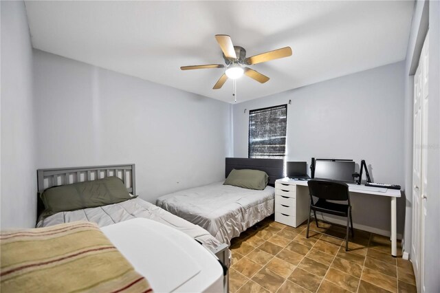 1122 42nd Ter E, Bradenton, FL 34208 - bedroom featuring ceiling fan and an office area
