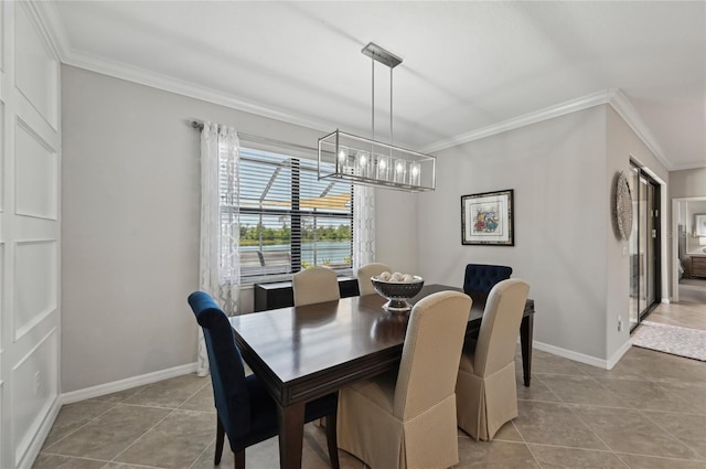 13587 Vancanza Dr, Venice, FL 34293 - dining space featuring crown molding, tile patterned floors, an inviting chandelier, and baseboards