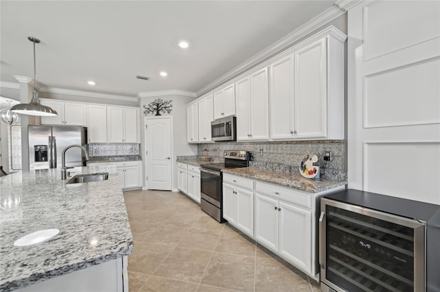 13587 Vancanza Dr, Venice, FL 34293 - kitchen with crown molding, a sink, stainless steel appliances, decorative backsplash, and wine cooler