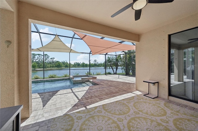 13587 Vancanza Dr, Venice, FL 34293 - view of patio with a water view, ceiling fan, a lanai, and a pool with connected hot tub