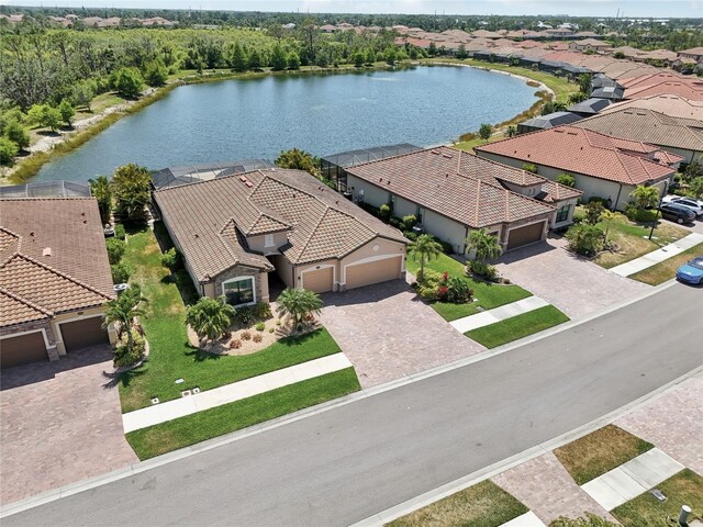 13587 Vancanza Dr, Venice, FL 34293 - drone / aerial view featuring a water view and a residential view
