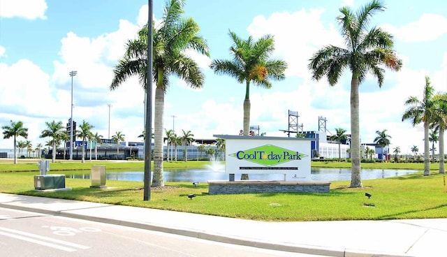 13587 Vancanza Dr, Venice, FL 34293 - surrounding community with a lawn and a water view