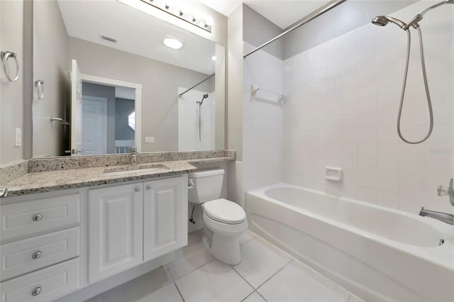 full bath featuring washtub / shower combination, vanity, toilet, tile patterned floors, and visible vents