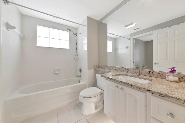 full bath with shower / bath combination, visible vents, tile patterned floors, vanity, and toilet