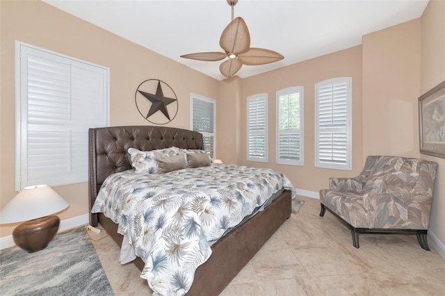 7624 Boltons Ct, Bradenton, FL 34201 - bedroom with baseboards and ceiling fan