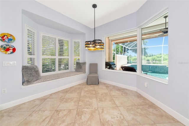 7624 Boltons Ct, Bradenton, FL 34201 - dining room with a chandelier and baseboards