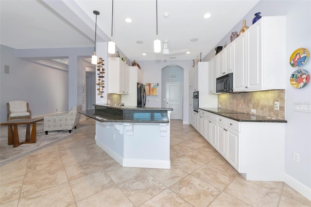 7624 Boltons Ct, Bradenton, FL 34201 - kitchen with black appliances, a peninsula, decorative backsplash, white cabinetry, and recessed lighting