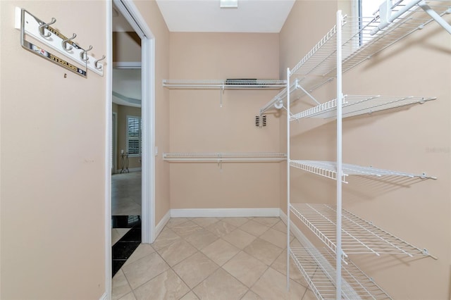 7624 Boltons Ct, Bradenton, FL 34201 - walk in closet with tile patterned flooring