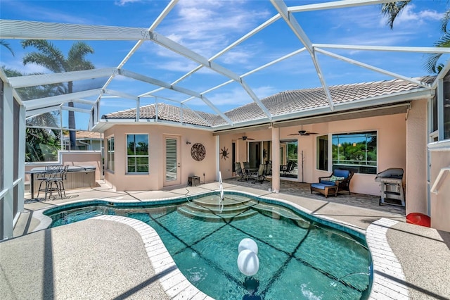 7624 Boltons Ct, Bradenton, FL 34201 - swimming pool featuring a patio area, a ceiling fan, a covered hot tub, and a grill