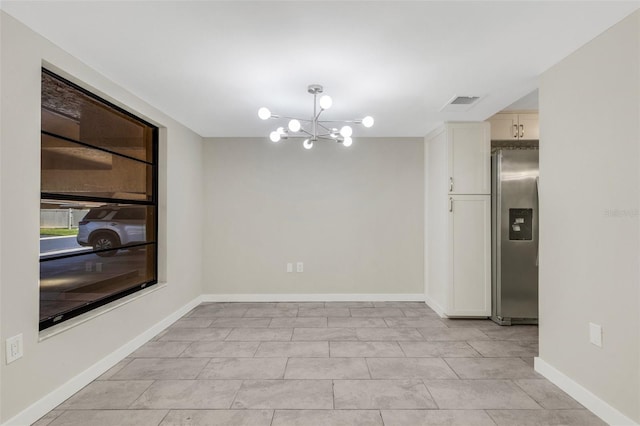 2319 Beneva Ter Unit 2284, Sarasota, FL 34232 - unfurnished dining area with an inviting chandelier, baseboards, light tile patterned flooring, and visible vents