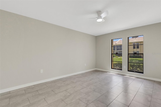 2319 Beneva Ter Unit 2284, Sarasota, FL 34232 - tiled spare room featuring baseboards and a ceiling fan