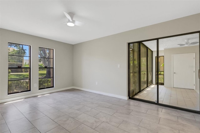 2319 Beneva Ter Unit 2284, Sarasota, FL 34232 - unfurnished room featuring baseboards, ceiling fan, and light tile patterned flooring
