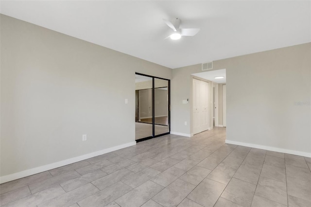 2319 Beneva Ter Unit 2284, Sarasota, FL 34232 - spare room with light tile patterned floors, baseboards, ceiling fan, and visible vents