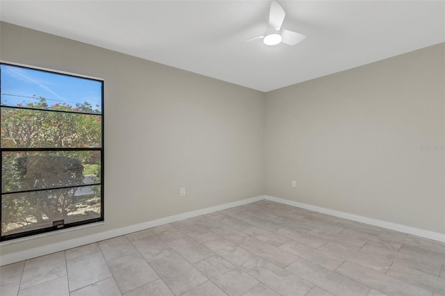 2319 Beneva Ter Unit 2284, Sarasota, FL 34232 - spare room featuring a ceiling fan and baseboards