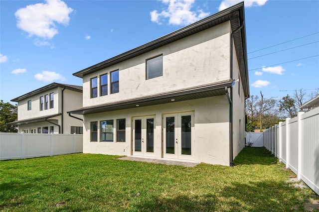 3113 W Nassau St, Tampa, FL 33607 - rear view of house featuring french doors and stucco siding