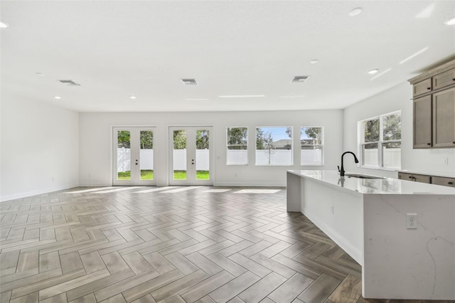 3113 W Nassau St, Tampa, FL 33607 - kitchen featuring open floor plan, plenty of natural light, baseboards, and recessed lighting