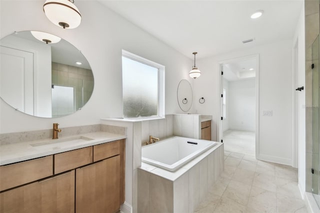 3113 W Nassau St, Tampa, FL 33607 - full bath featuring a shower stall, a bath, two vanities, marble look tile flooring, and recessed lighting