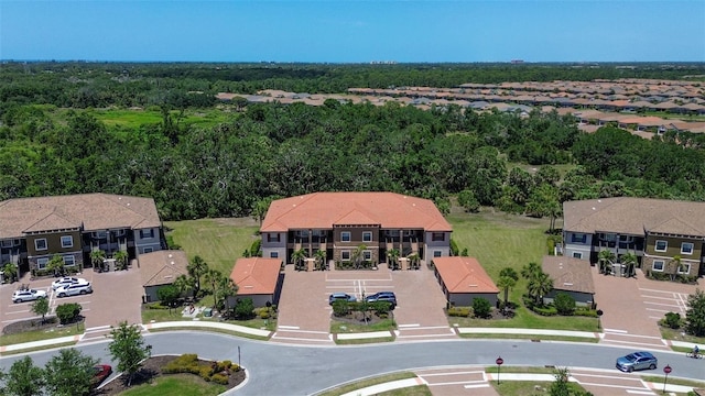 bird's eye view with a residential view and a forest view