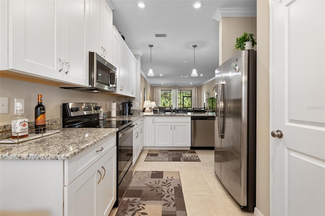 kitchen featuring visible vents, light stone countertops, white cabinets, stainless steel appliances, and recessed lighting