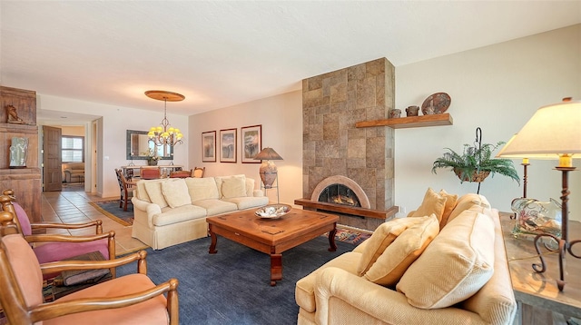 2185 Gulf Of Mexico Dr Unit 243, Longboat Key, FL 34228 - living area featuring a chandelier and a tiled fireplace