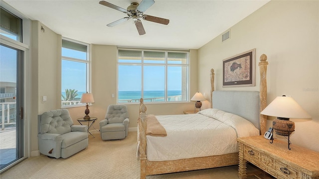 2185 Gulf Of Mexico Dr Unit 243, Longboat Key, FL 34228 - bedroom with carpet, access to outside, a ceiling fan, and a water view