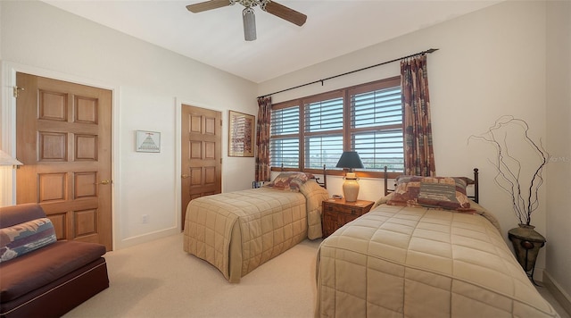 2185 Gulf Of Mexico Dr Unit 243, Longboat Key, FL 34228 - bedroom with baseboards, carpet, and a ceiling fan