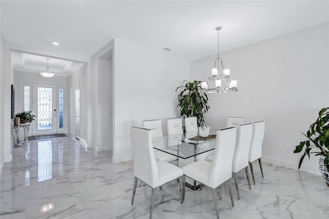 6203 Grandview Hill Ct, Bradenton, FL 34203 - dining space featuring light marble finish floors, a tray ceiling, a chandelier, crown molding, and recessed lighting