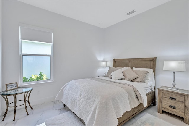 6203 Grandview Hill Ct, Bradenton, FL 34203 - bedroom with light marble finish flooring and baseboards