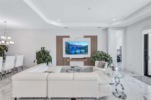 6203 Grandview Hill Ct, Bradenton, FL 34203 - living area featuring a raised ceiling, a chandelier, light marble finish floors, and recessed lighting