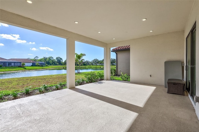 6203 Grandview Hill Ct, Bradenton, FL 34203 - view of patio featuring a water view