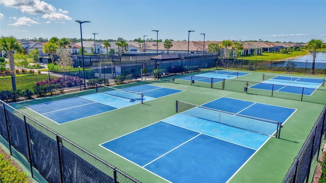 6203 Grandview Hill Ct, Bradenton, FL 34203 - view of tennis court featuring a residential view