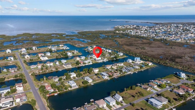 drone / aerial view with a water view