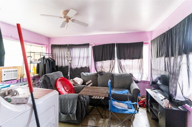 interior space with washer / dryer and ceiling fan