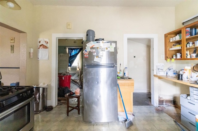 kitchen with stainless steel appliances and tile patterned floors