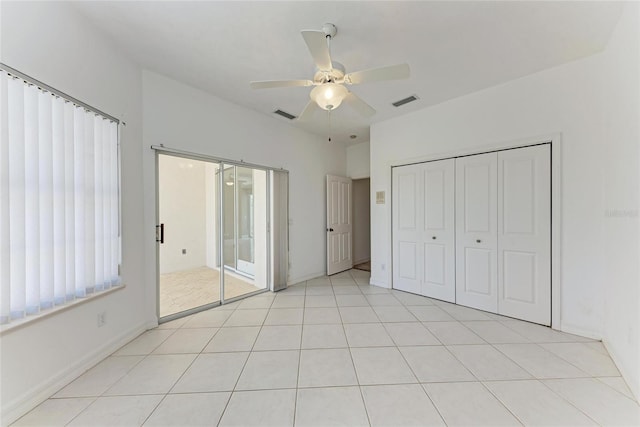 585 Khyber Ln, Venice, FL 34293 - unfurnished bedroom featuring ceiling fan, a closet, and access to outside