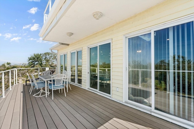 4717 Lemon Bay Dr, Venice, FL 34293 - wooden deck featuring outdoor dining space