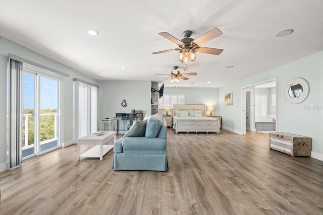 4717 Lemon Bay Dr, Venice, FL 34293 - bedroom featuring access to outside, recessed lighting, baseboards, and wood finished floors