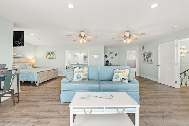 4717 Lemon Bay Dr, Venice, FL 34293 - living area featuring a ceiling fan, recessed lighting, and light wood-type flooring